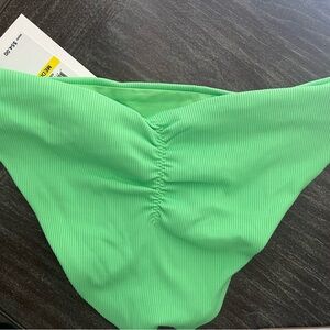 BECCA women’s ribbed green bikini bottoms. Discounted shipping.